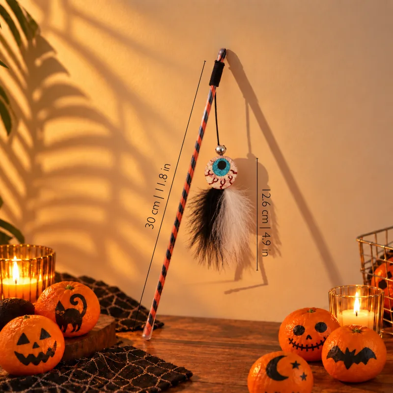 Evil Eye Halloween cat toy wand with fluffy feathers designed for interactive chasing and playful cat activities.