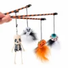 Halloween cat toy wand set featuring skeleton ghost pumpkin and evil eye feather designs for cats