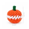 Orange pumpkin shaped cotton rope dog toy with size measurement, showing a rounded vegetable design made for puppies and small dogs to hold and carry.