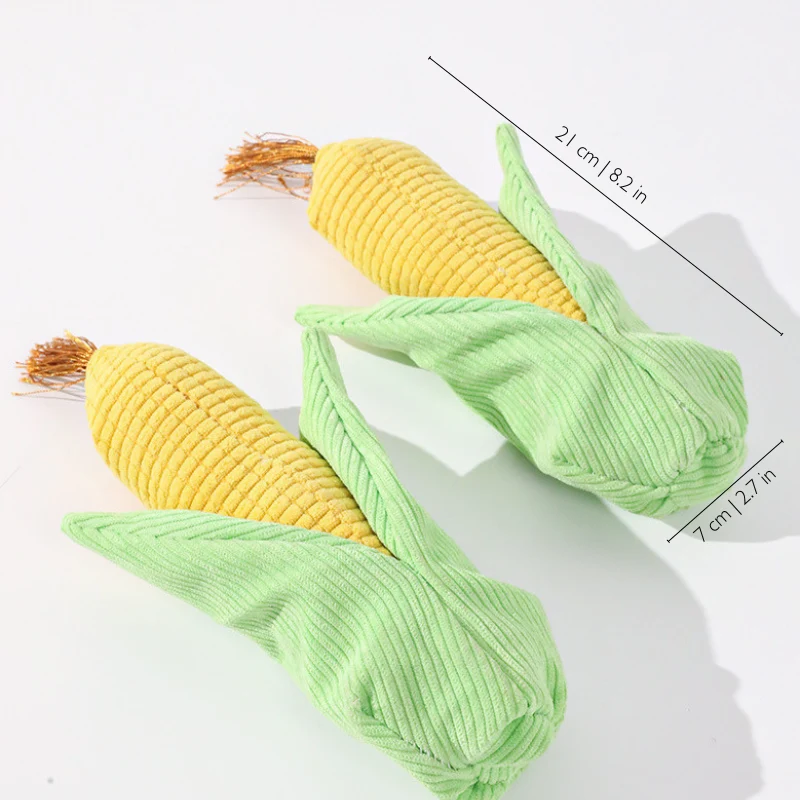 corn-plush-toy-size-guide Two corn plush toys for dogs shown with measurement lines indicating a length of 21 cm and a width of 7 cm.