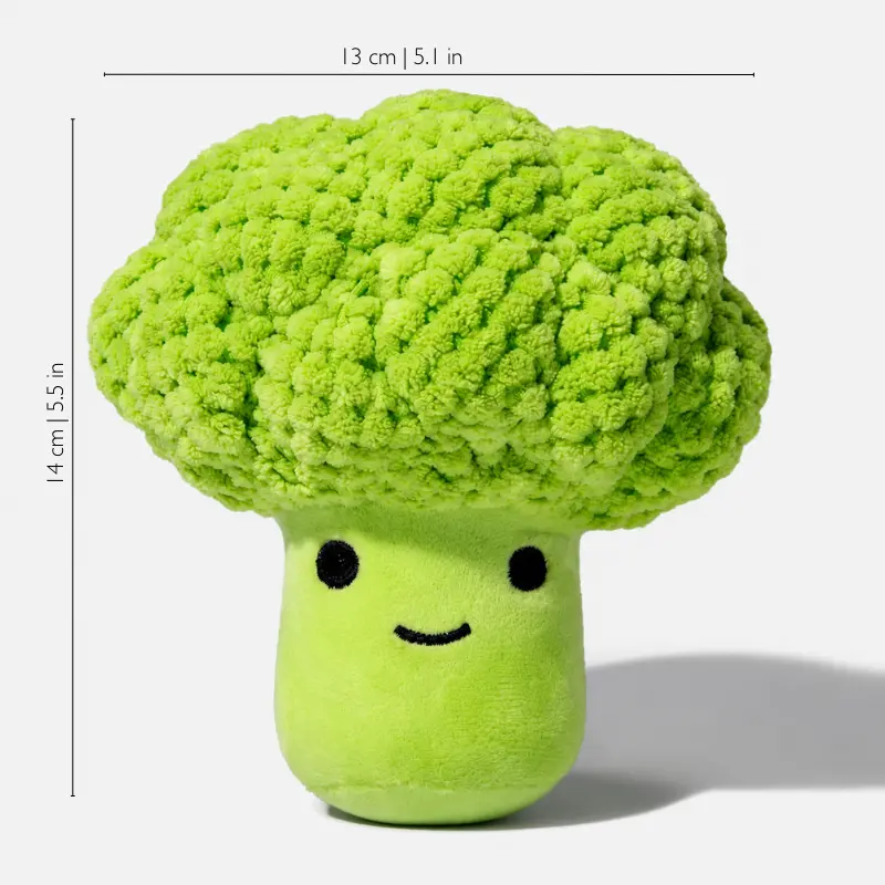 green-broccoli-dog-toy-size-guide A green dog toy shaped like a smiling broccoli, shown with measurements of 13 cm wide and 14 cm tall.