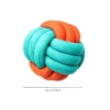 orange-turquoise-rope-knot-ball-dog-toy Orange and turquoise rope knot ball dog toy featuring a colorful braided design, creating an easy-to-grab shape for dogs who enjoy carrying and tugging.
