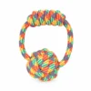Rainbow rope ring dog toy with a wrapped hand grip and large chunky knot, made from thick woven rope for supervised tugging and carrying play.