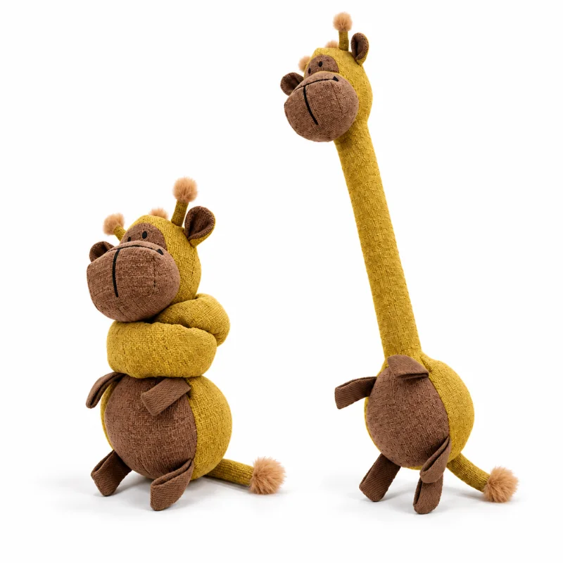Two adorable dog toys in a giraffe design, one with an extended neck and the other with the neck looped around its body against a white background.