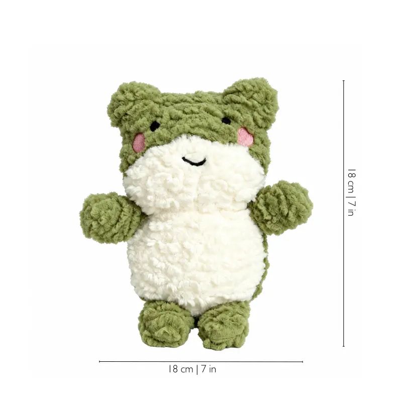 Sage-green frog toy for dogs with a cream belly, pink cheeks, and short limbs, shown with 18 × 18 cm (7 × 7 in) measurements.